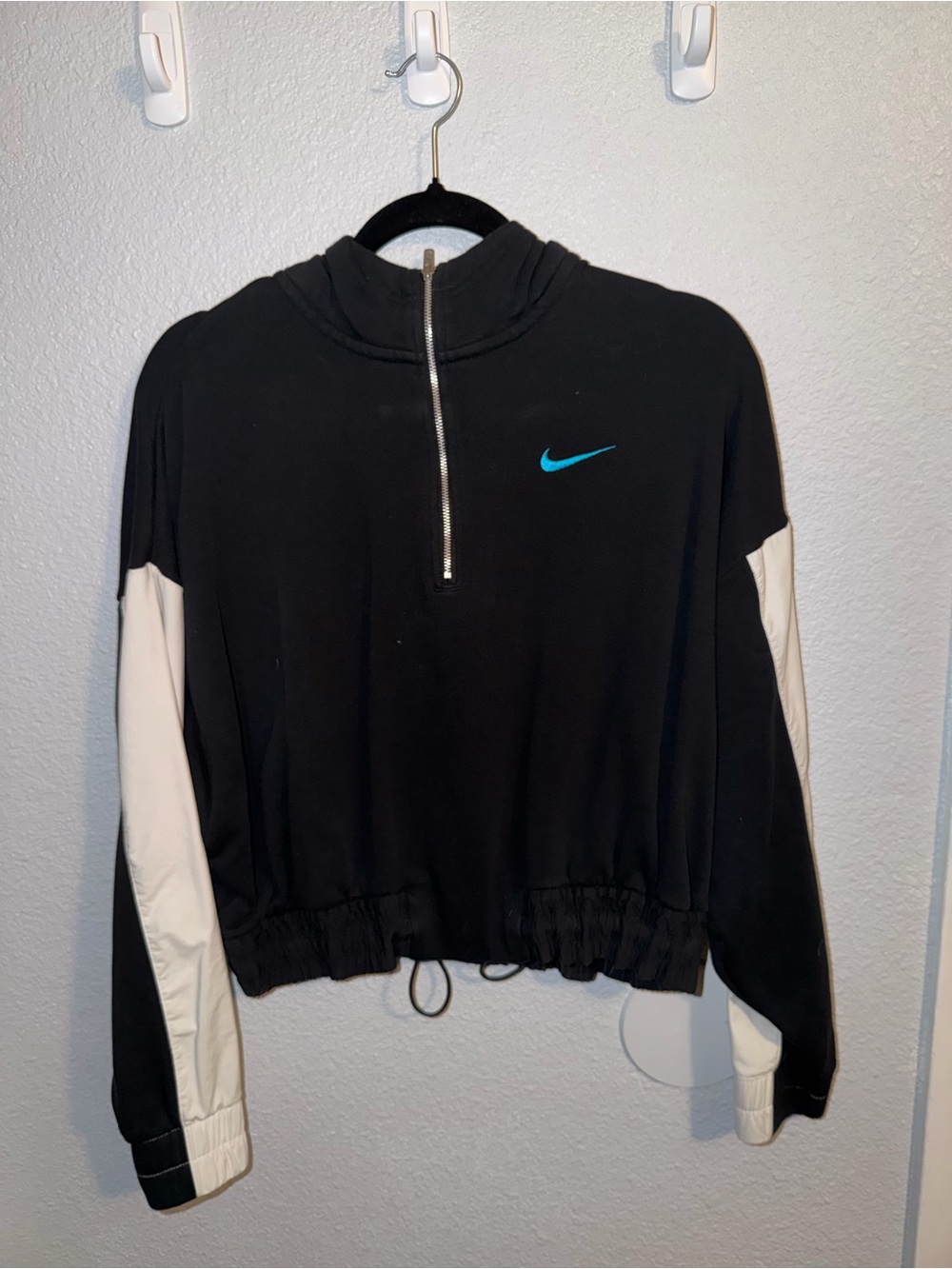 Nike Black Cropped Half-Zip Hoodie with White Sleeve Panels and Teal Swoosh
